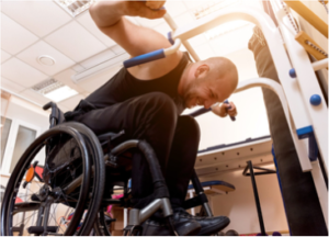 Paraplegic working hard to build upper body strength 