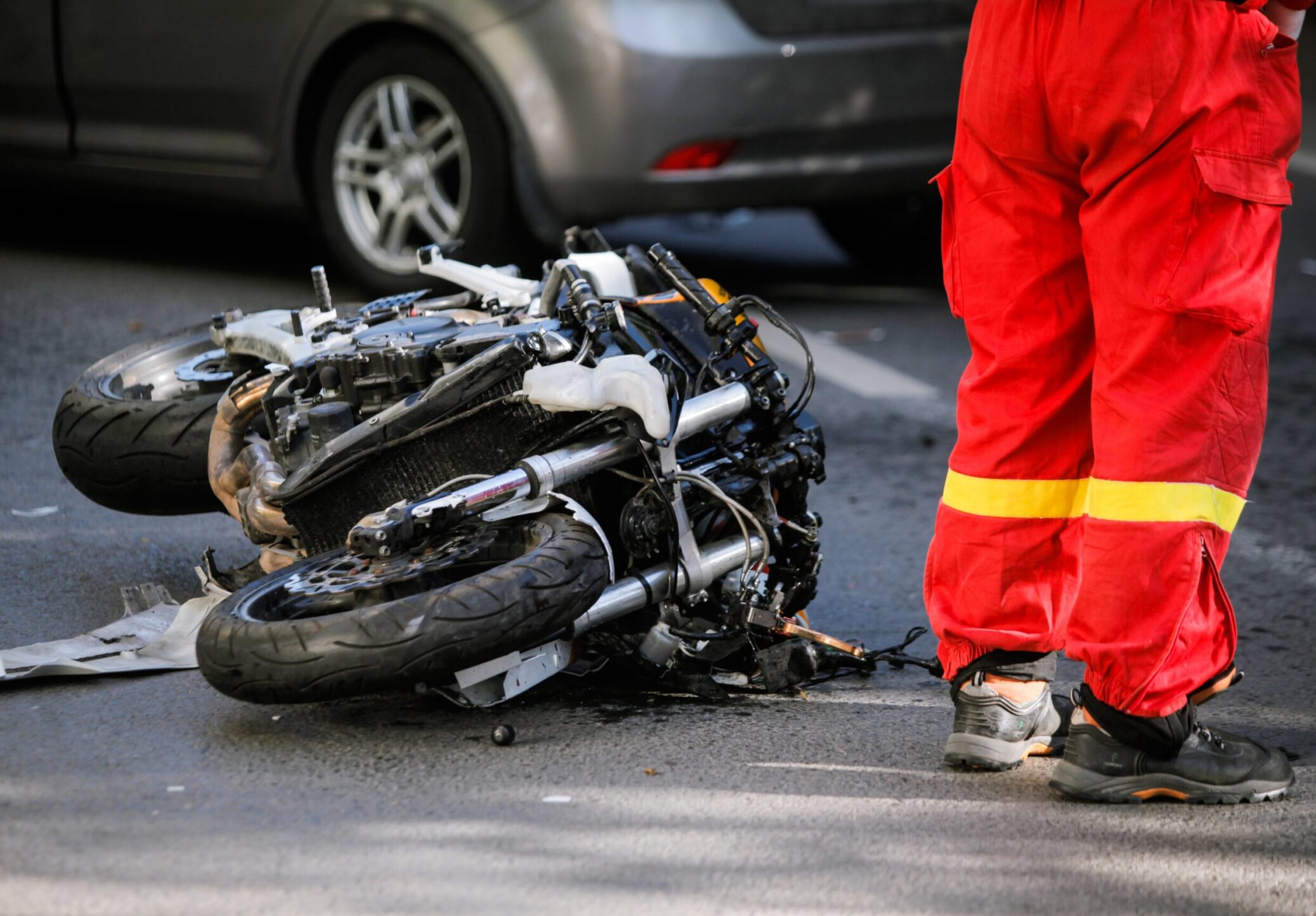 Crashed,Motorcycle,After,Road,Accident,With,A,Car,On,A